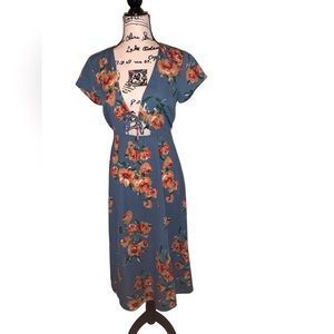 Lulu's floral spring dress. 100 percent polyester. Hand wash .  Size S